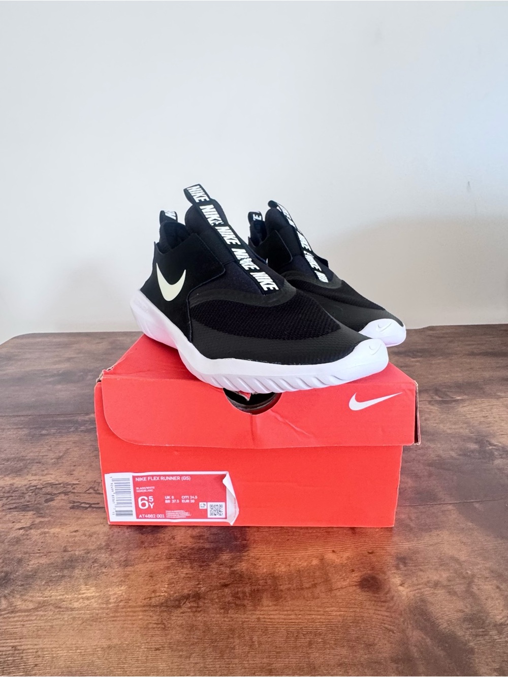 Nike Black and White Slip-On Athletic Sneakers
